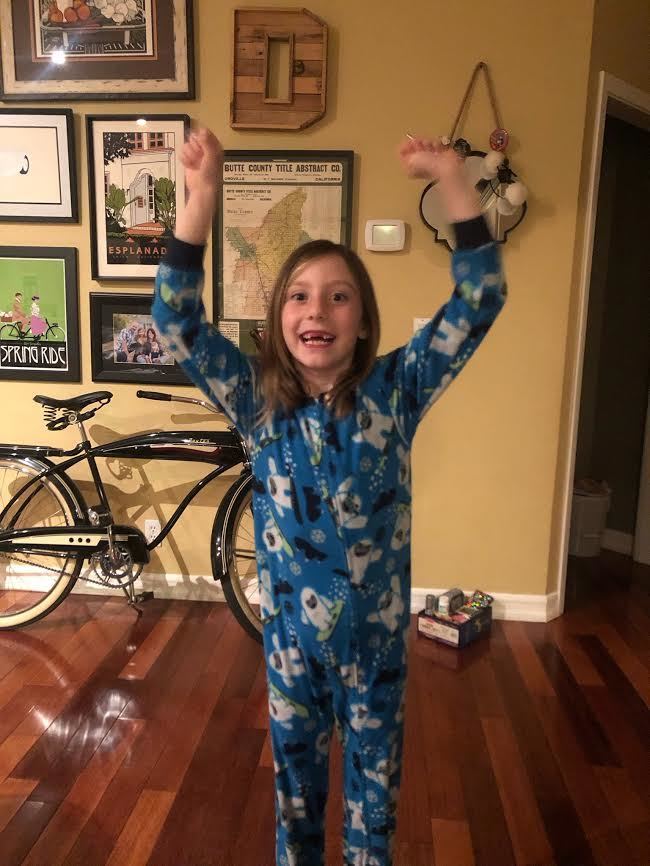 Finding out she gets to use a Chromebook for school work!